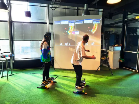 two players competiting with each other riding their skateboards
